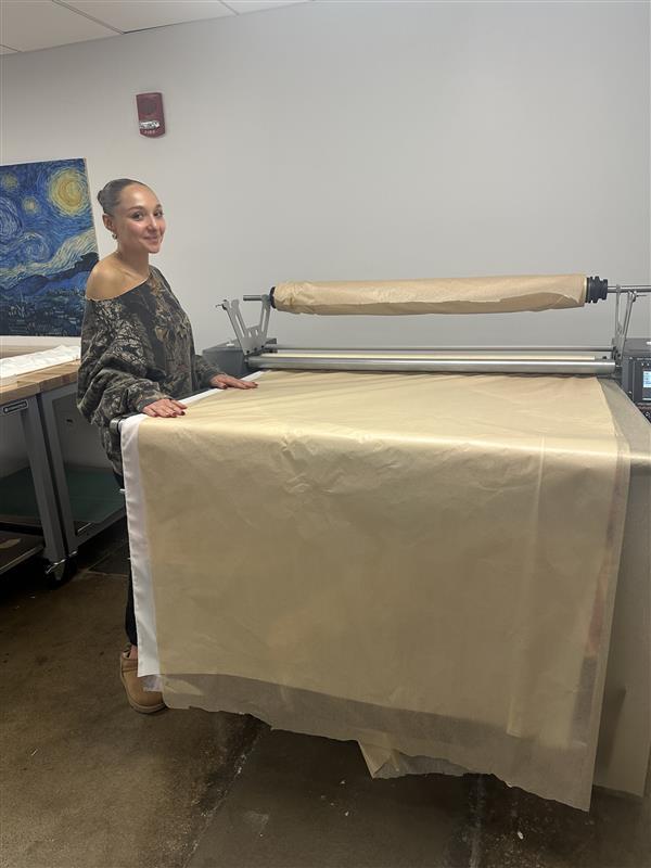 photo of Bella Rudy with dye sublimation printer