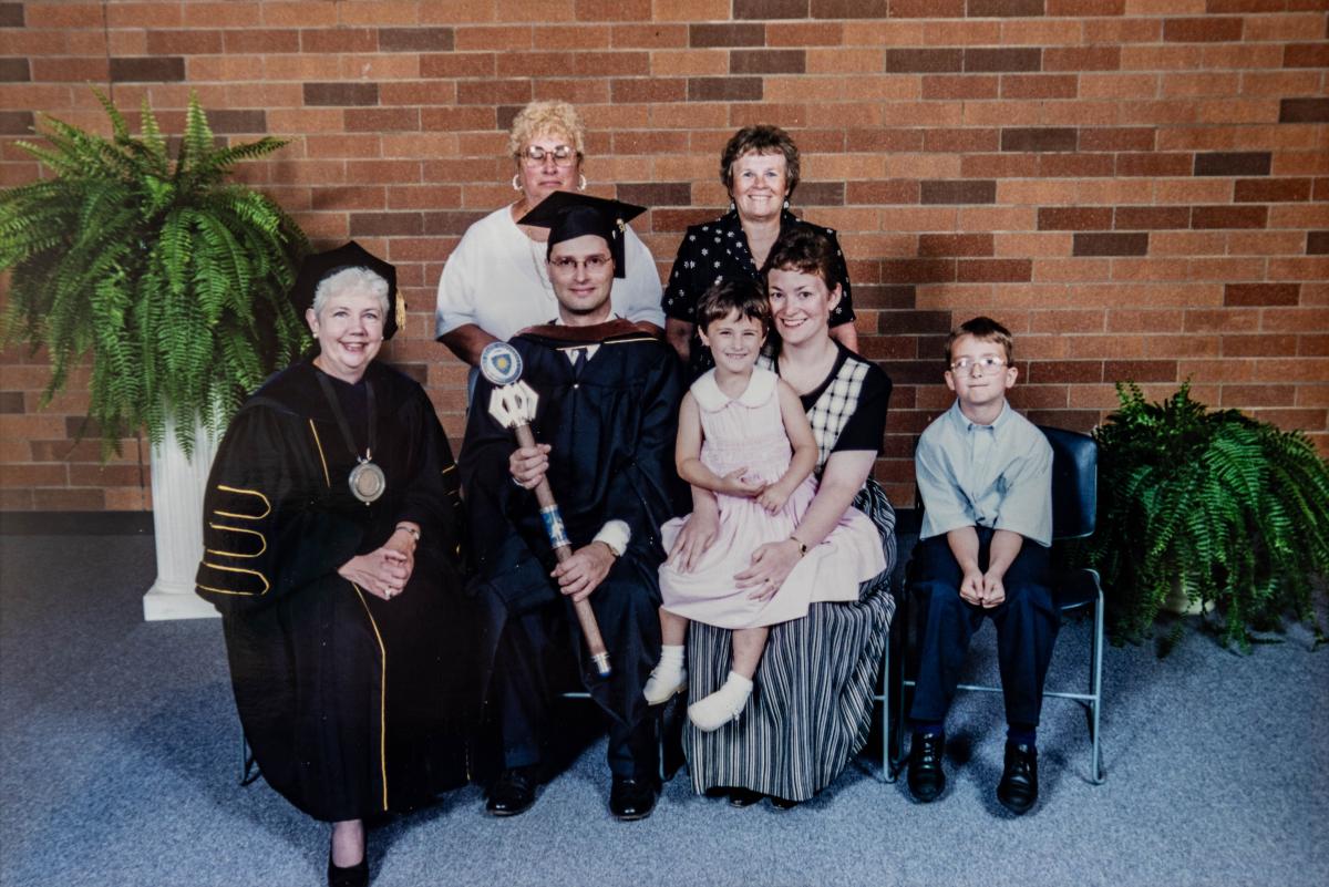 Michael Jaszczak and his family with Kent State University president, Carol A. Cartwright, PhD