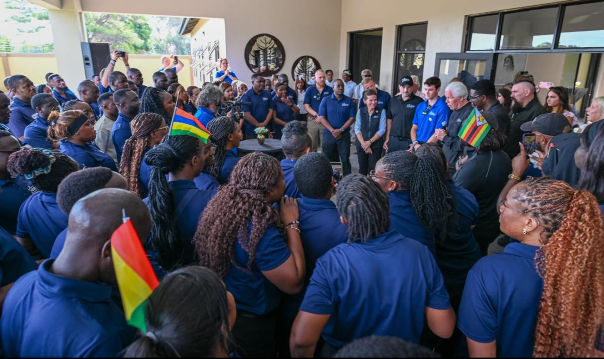 Starkey co-founder William Austin welcomes visitors to the Starkey Hearing Institute. 