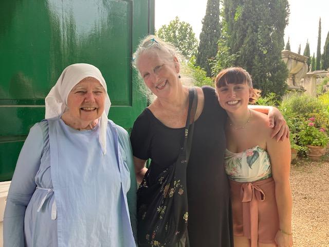 The caretaker of the English Cemetery, Professor Cone, and a student in a photo together.