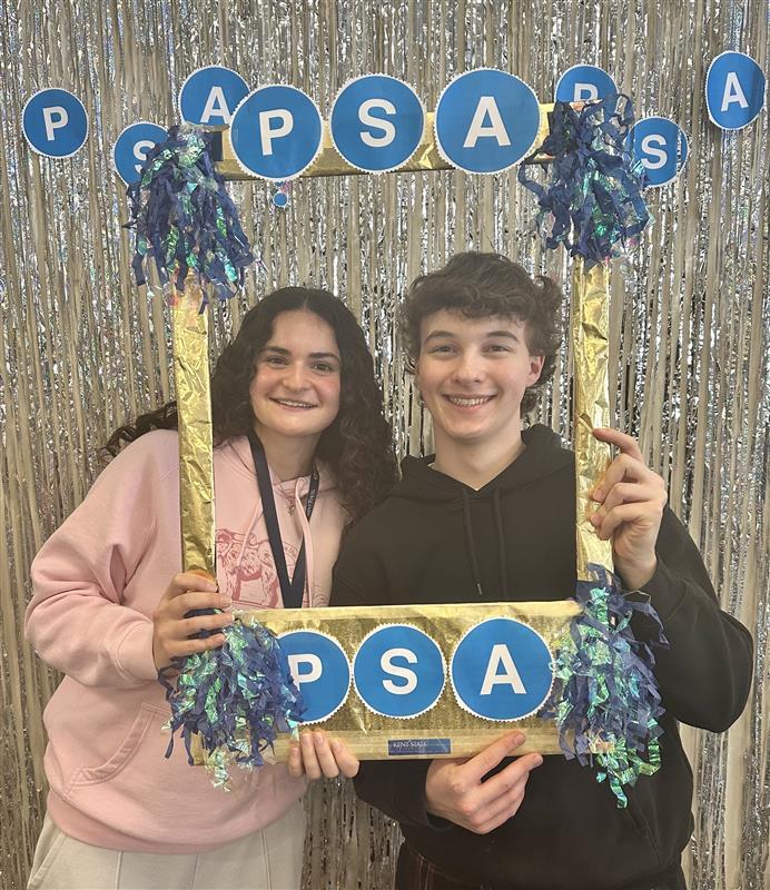 Kent State Honors College student Phoenix Allen poses for a photo at a P.S.A. event.