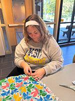 Jennifer Tedrow making her blanket. Jennifer Tedrow making her blanket.