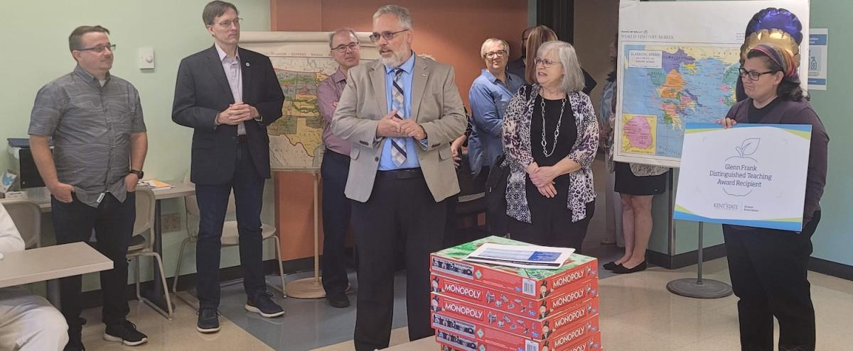 Jessica Leveto, Ph.D., receiving the 2025 Glenn Frank Distinguished Teaching Award