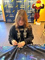 Katelyn Reinhart with her handiwork. Katelyn Reinhart with her handiwork.