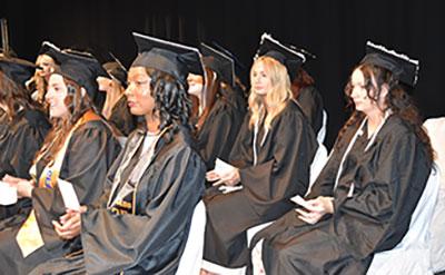 Waiting for their names to be called.