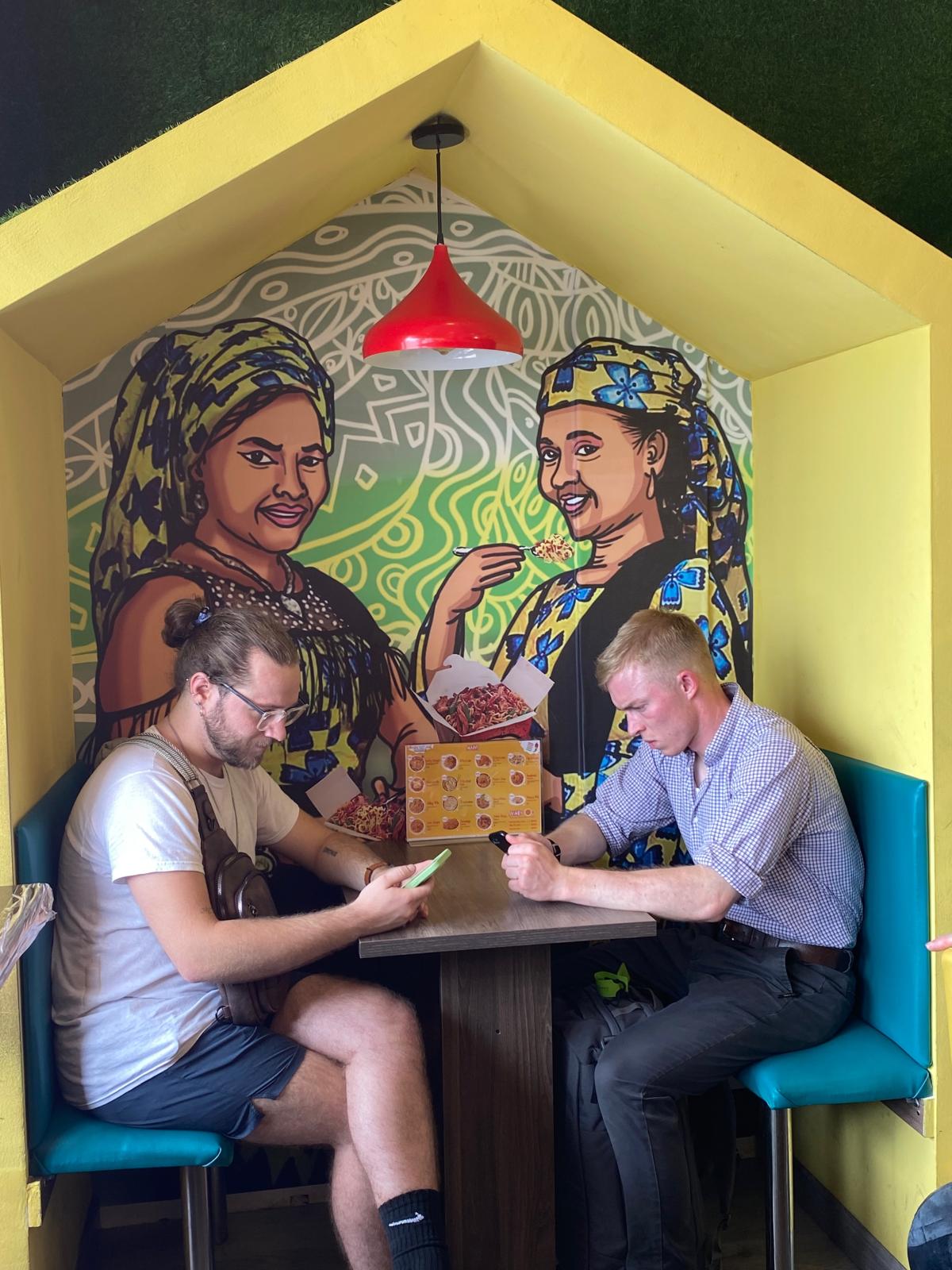 Kent State students enjoy lunch in Nigeria on their way to Kigali, Rwanda.
