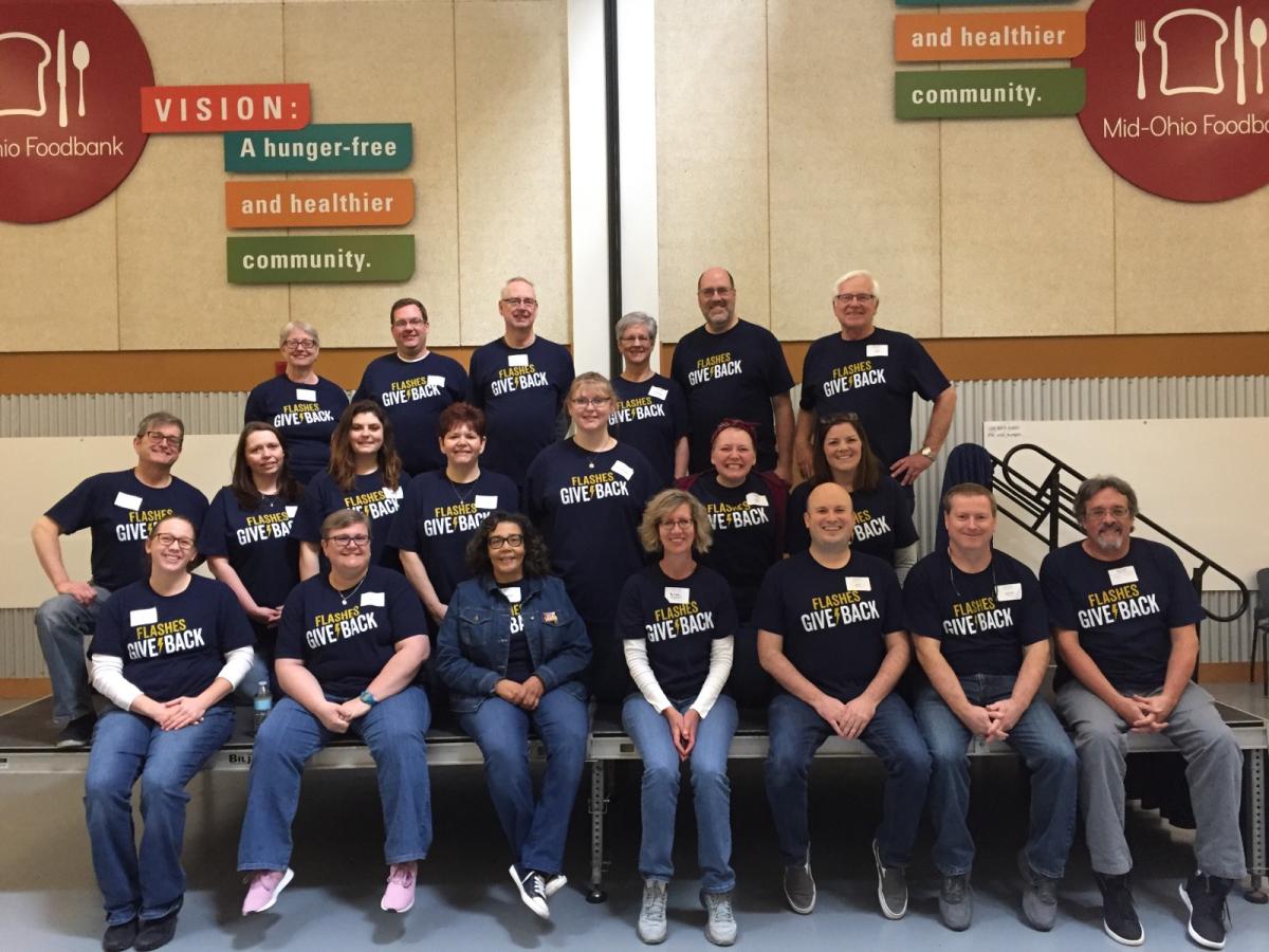 Kent State alumni smiling and posed for the camera during Alumni Day of Service