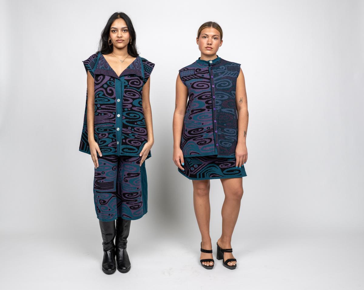 two models wearing knitwear sets featuring abstract blue and purple swirls