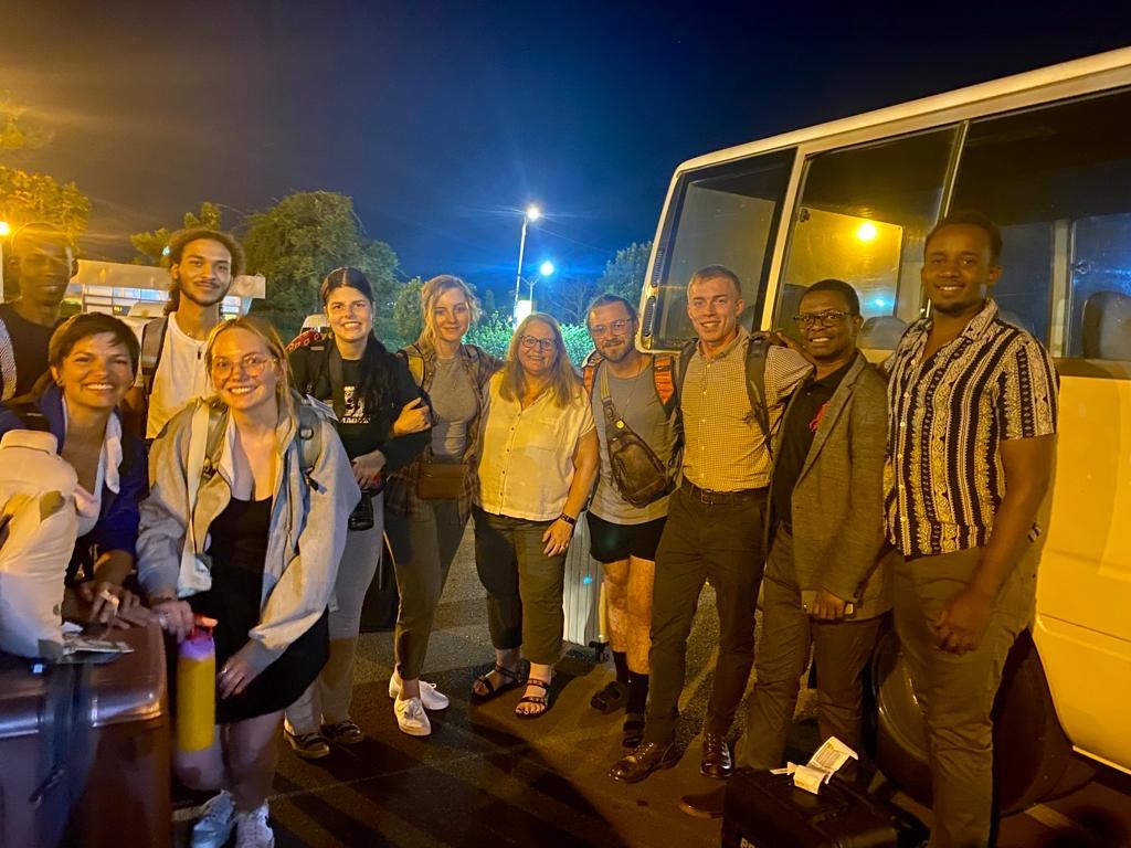 Pacifique Niyonzima, far right, program manager of 91����'s Office of Education Abroad in Africa, based in Kigali, Rwanda, greets students taking part in the Kigali Summer Institute, upon their arrival in Rwanda on July 2, 2023..