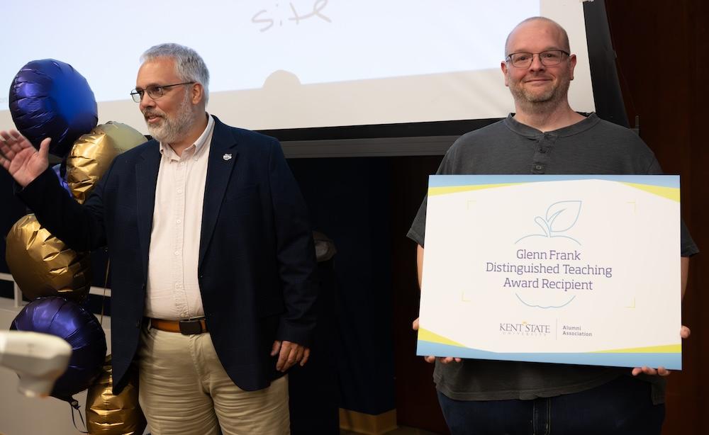 James Redfearn, Ph.D., receiving the Glenn Frank Distinguished Teaching Award 