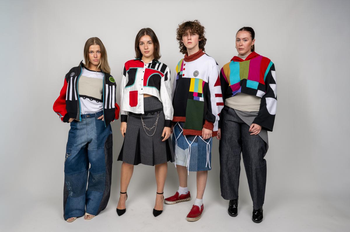 four models wear garments with multi-colored asymmetrical geometric patterning