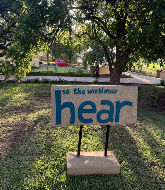 "So the World May Hear" sign in Zambia.