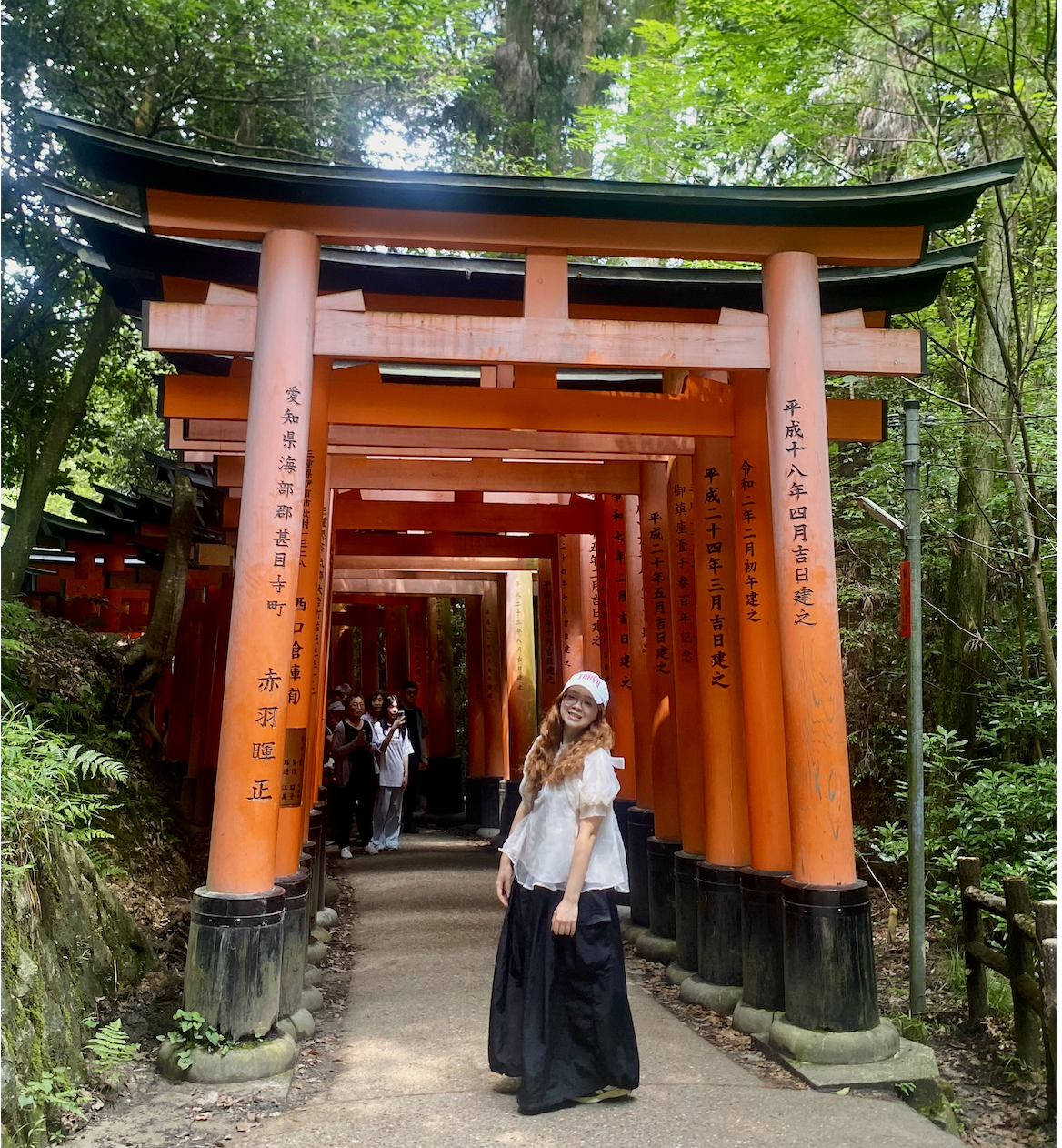Ana at a shrine in Japan.