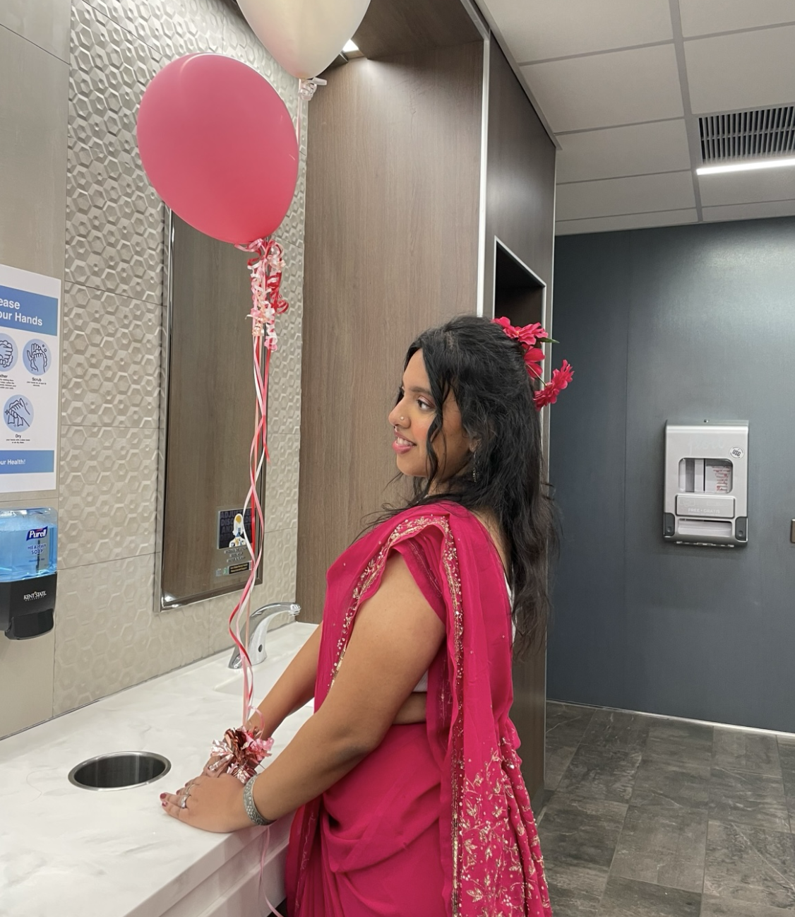 Ittiba wearing a pink saree