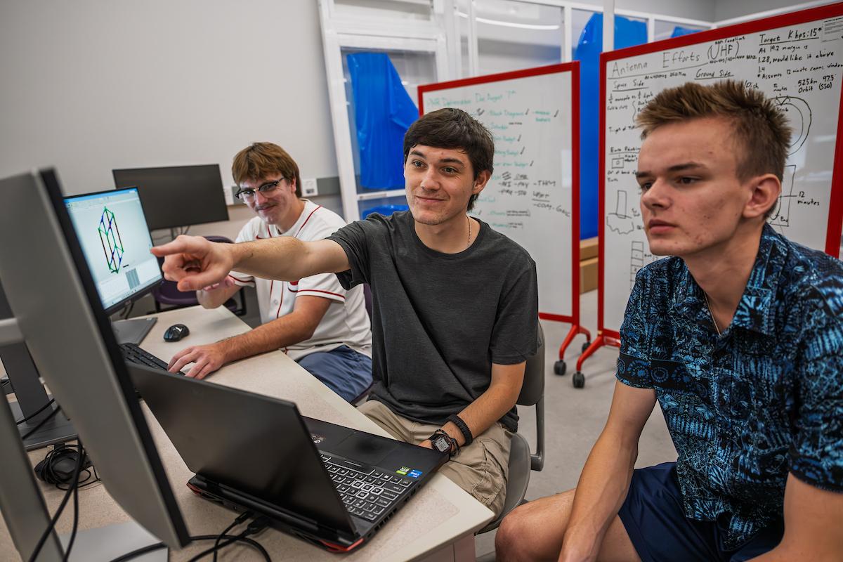 Students are working in the Spacecraft Design Lab to build a satellite as part of the University Nanosatellite Program.