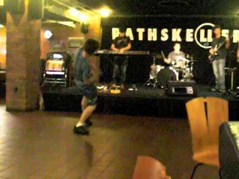 A throwback photo of a band playing at the Rathskeller in the basement of the Kent Student Center.