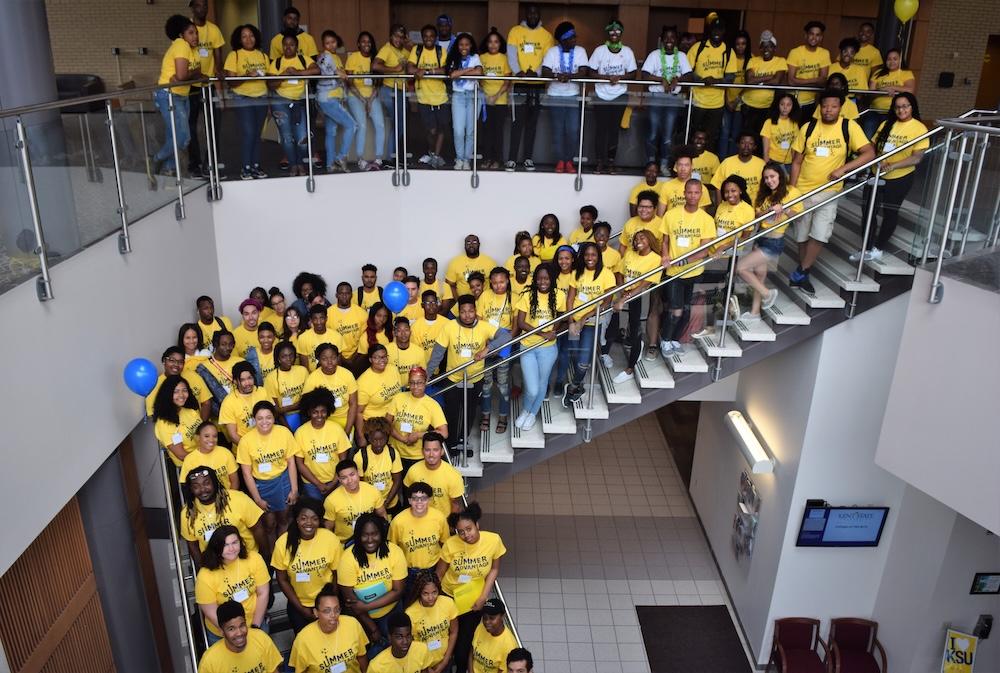 Dozens of Summer Advantage students standing on stairs.