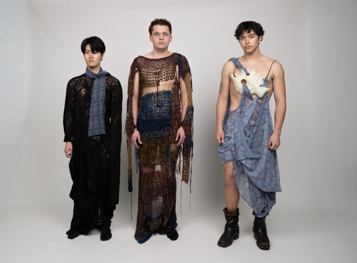 three models wearing unique knit wear outfits resembling dresses