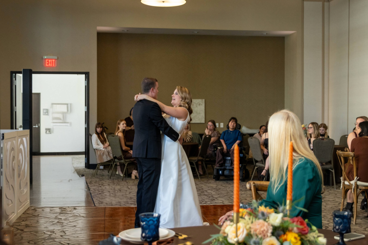 Bride and groom dancing at the reception. 