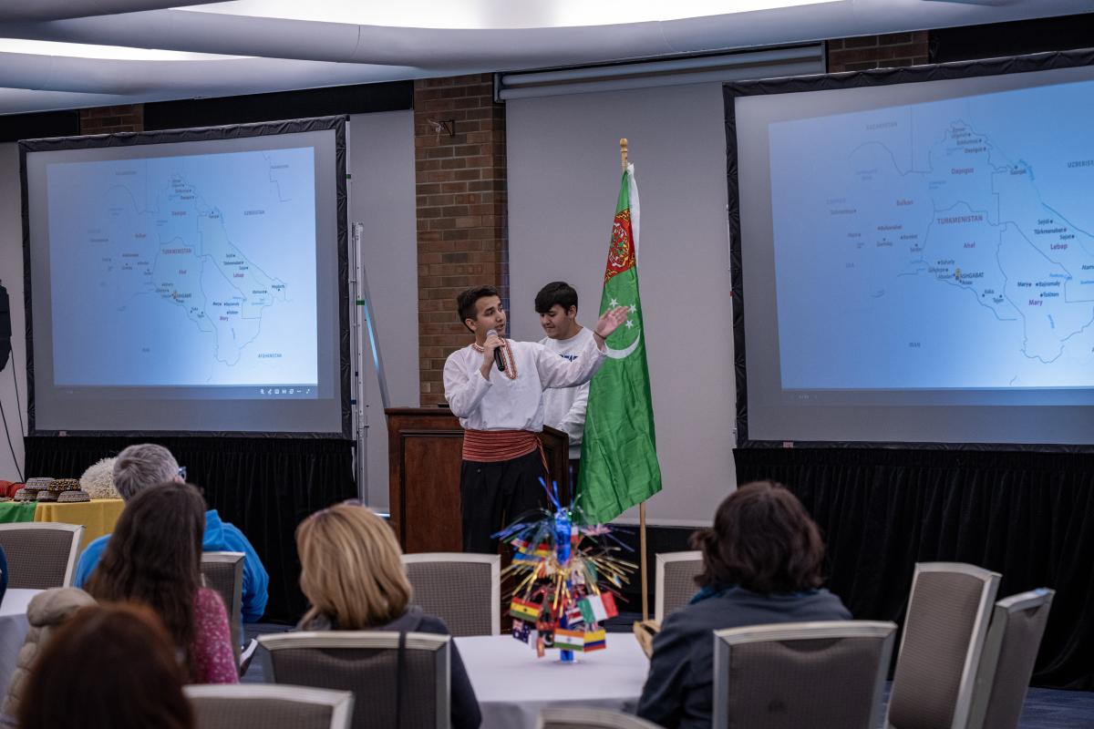 Arslan presenting at the Cultural Cafe