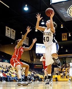Shields playing on the Women's Basketball team