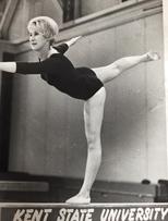 Joan Ganim balancing on a balance beam