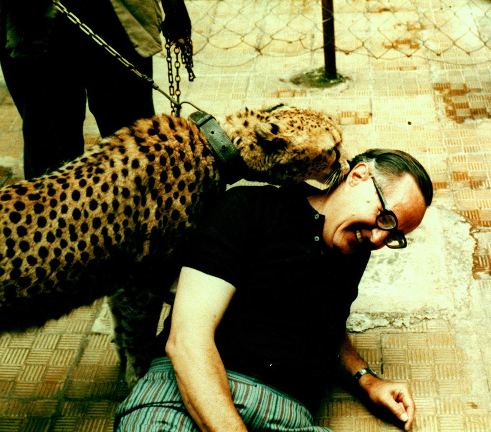 Gerald Read interacts with a leopard