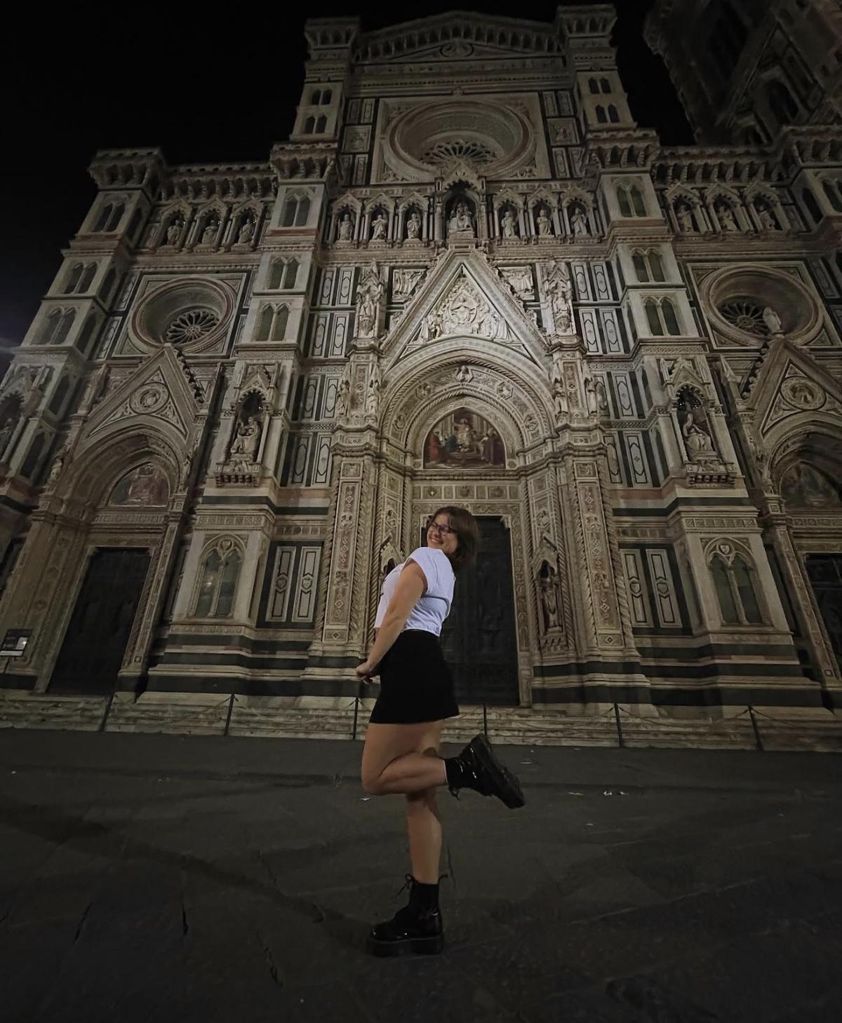 Ali in front of the Duomo in Florence at night.
