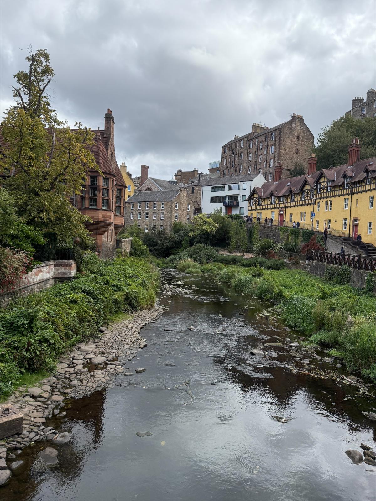 historical buildings along a river in Scotland