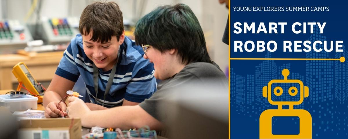 Young Explorers Camp: Smarty city Robo Rescue with a photo of two youth working on an engineering project.