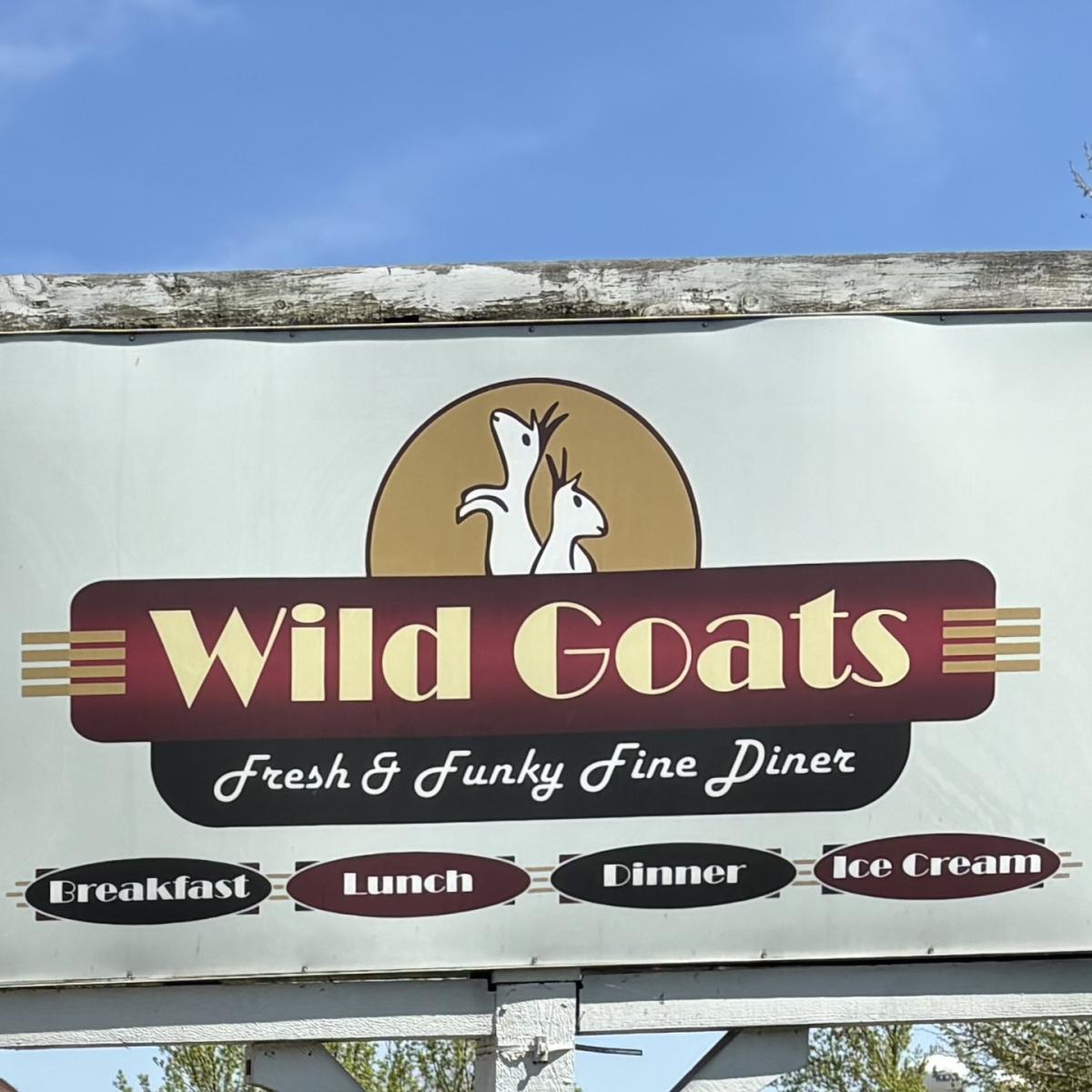 Close up of Wild Goats restaurant sign