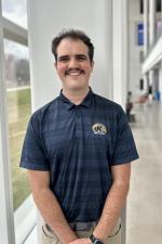 Braden smiling at camera