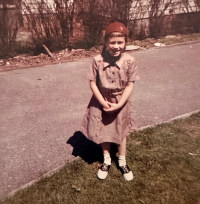 Young Laura Davis in her Brownie uniform. 
