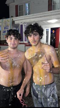 Blake and a fraternity brother covered in egg
