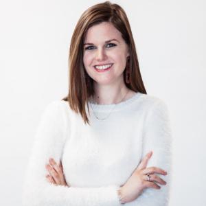 Anne Johnson posing against white background