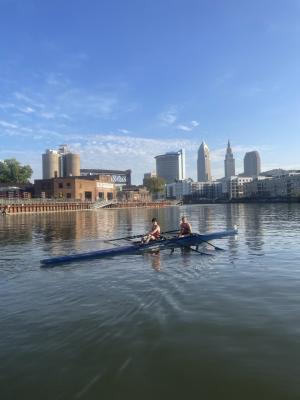 Two young people on a boat on the river