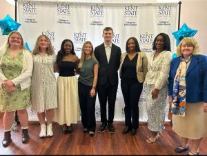 Madelyn stands with other students from the College of Public Health.