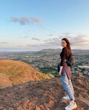 Loustella poses for a picture on one of her study abroad trips