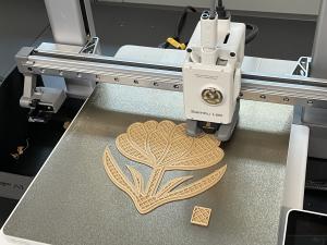 flower stamp getting printed on a 3d printer