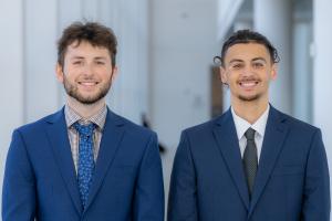 shadow desk ai team smiling in blue suits