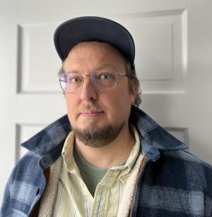 Headshot of Jason Less Starin