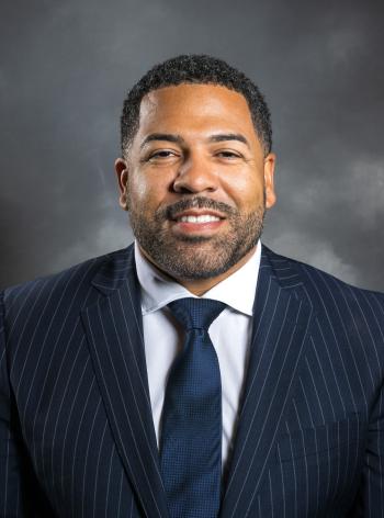 Trustee Larry L . Macon, Jr.