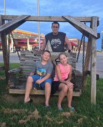 Matthew Crocker with his young son and daughter