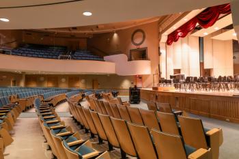 Auditorium with empty seats and a stage