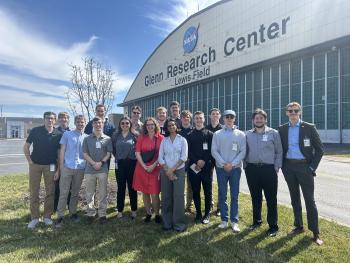 Ethan stands with co-workers outside a NASA research center