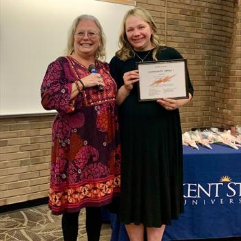 Lorene Martin (left) presented Isabella Baird with the Kent State Coll Lorene Martin (left) presented Isabella Baird with the Kent State College of Nursing Community Impact Award.
