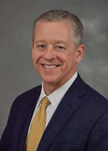 Trustee Shawn M. Riley