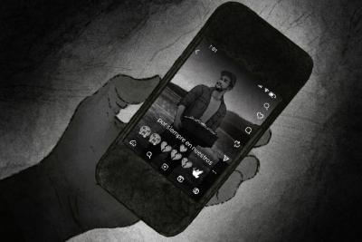 Black and white illustration of a hand holding a cellphone