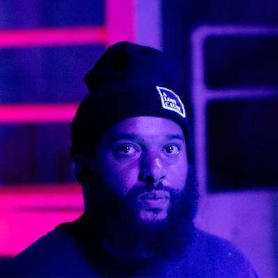 pink and purple lighted shot of dadisi curtis