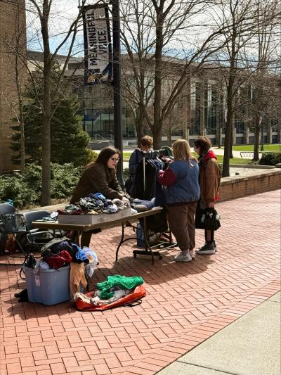 Students participate in a clothing swap hosted by a Community Action Fellow